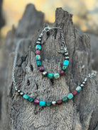 Sterling silver Jasper turquoise necklace with a detailed chain, featuring natural stone beads and intricate silver accents.