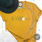 Wildflower Dandelion Mustard V-neck short sleeve graphic tee by The Graphic Tee, with colorful floral design on soft fabric.