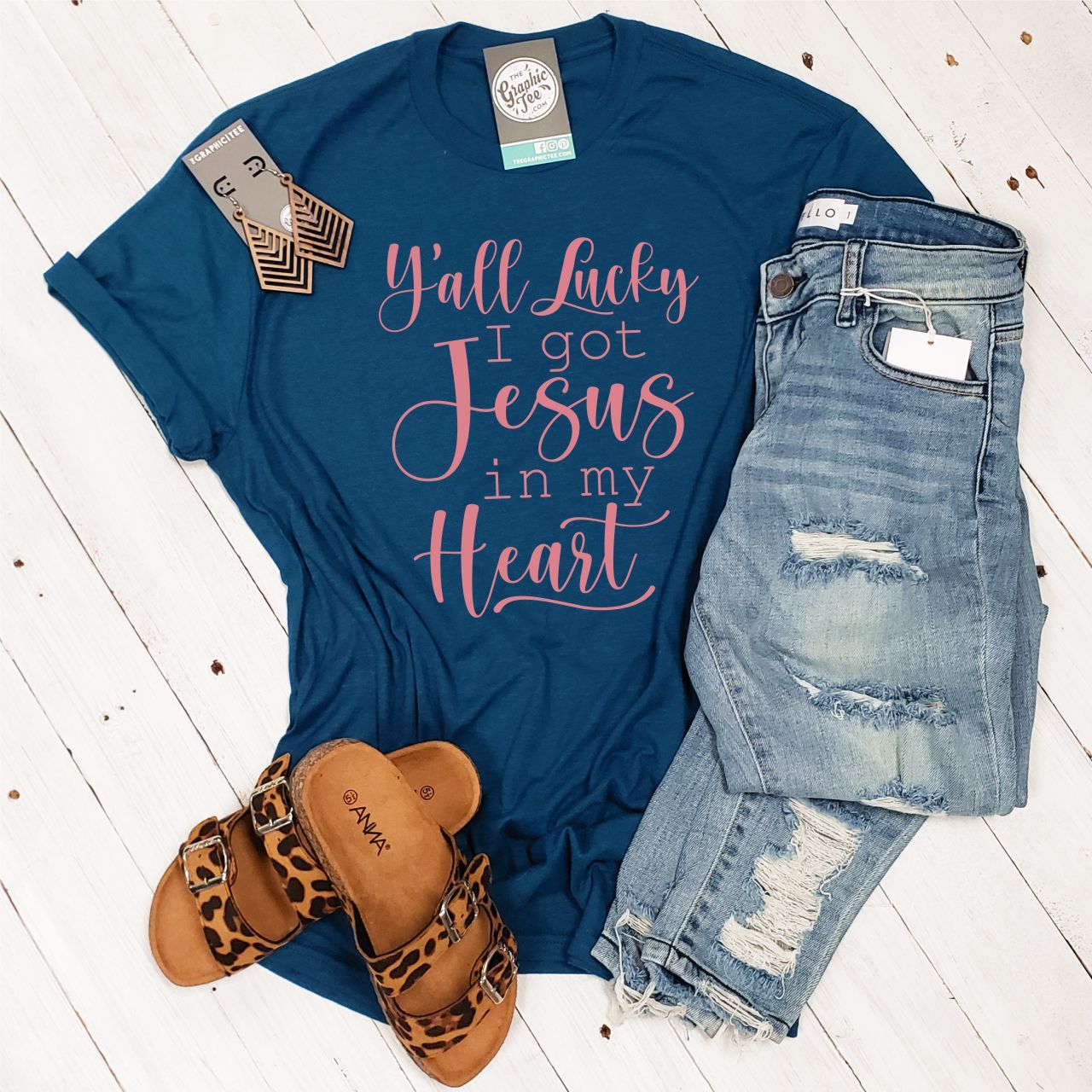 Adult SS graphic tee with "Y'all Lucky I Got Jesus in My Heart" print, made by The Graphic Tee, shown in the image.