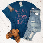 Adult SS graphic tee with "Y'all Lucky I Got Jesus in My Heart" print, made by The Graphic Tee, shown in the image.