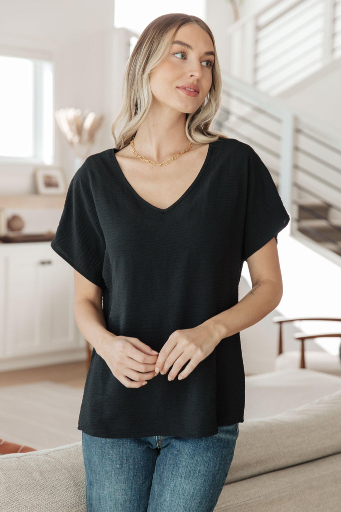 Frequently Asked Questions V-Neck Top in Black - Practical Magic Store