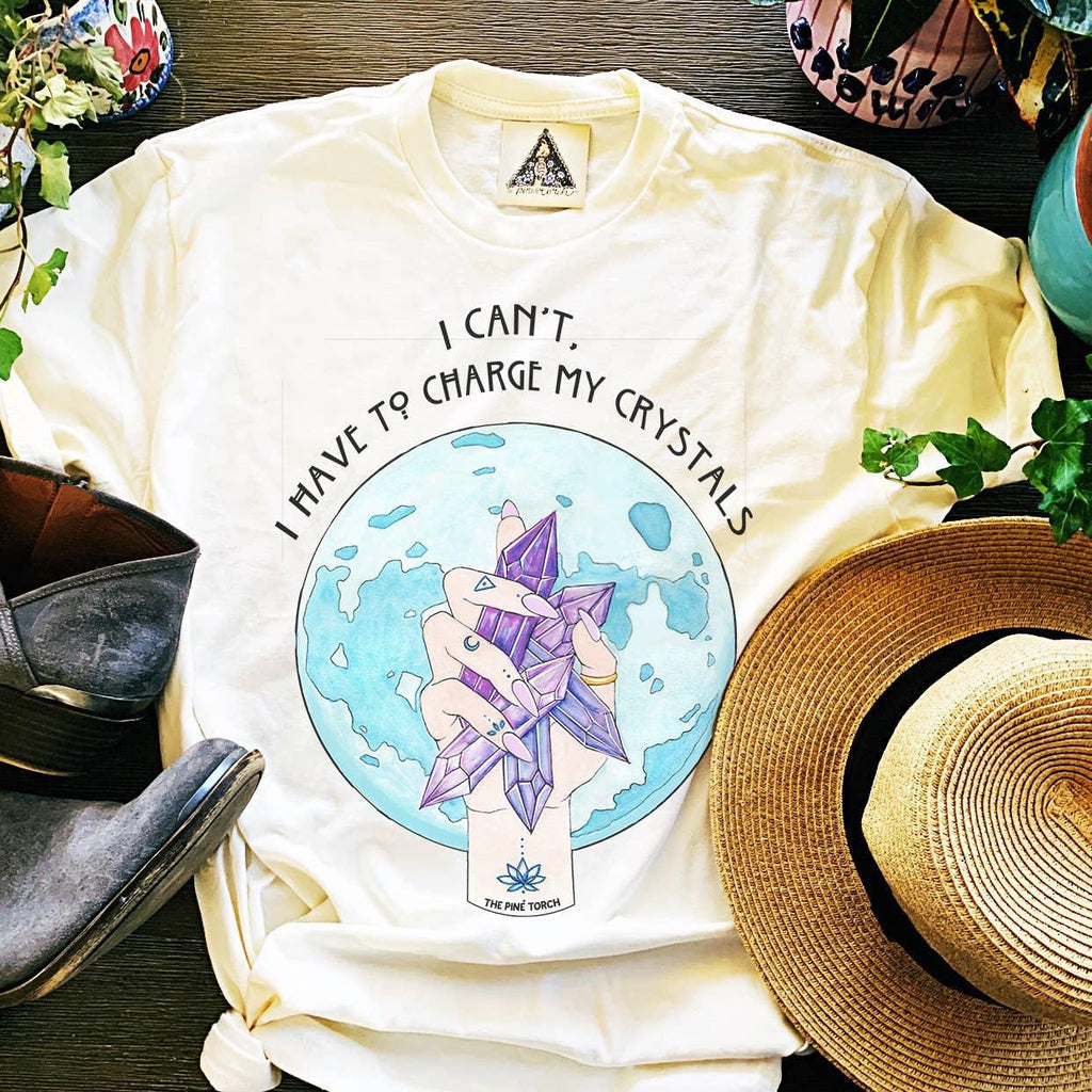 I Can't I Have To Charge My Crystals Cream Unisex Tee - Practical Magic Store