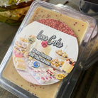 Love Cake soy wax melts by Practical Magic Store, featuring heart-shaped wax pieces with a sweet, bakery-inspired scent.